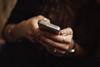 Brazil – woman texting priscilla-du-preez-BjhUu6BpUZA-unsplash